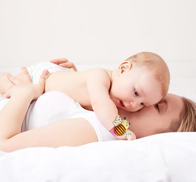Mom playing with a baby
